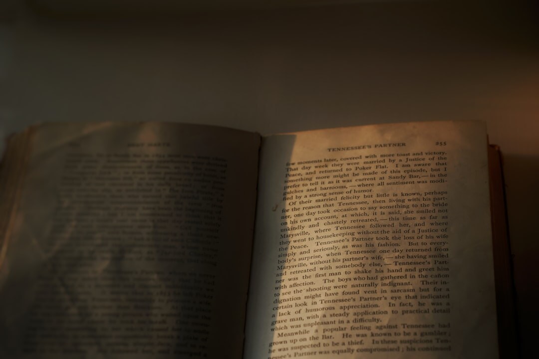 open mystery book in dim light