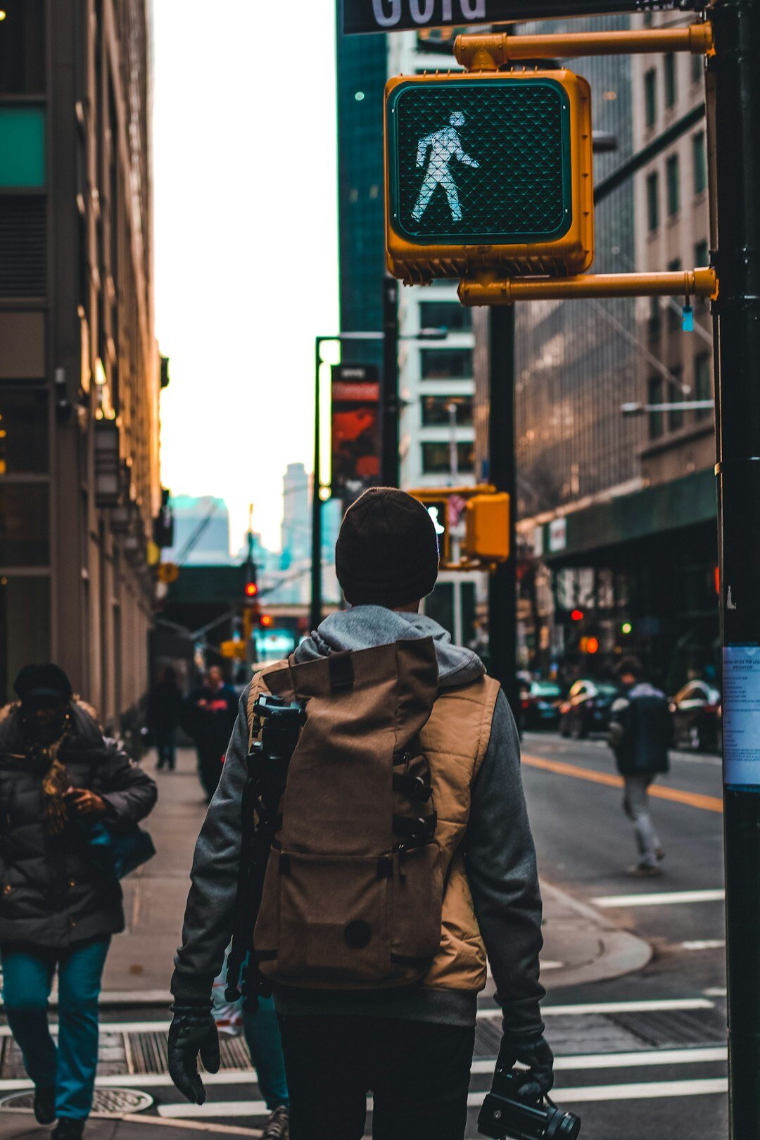 person walking alone in city